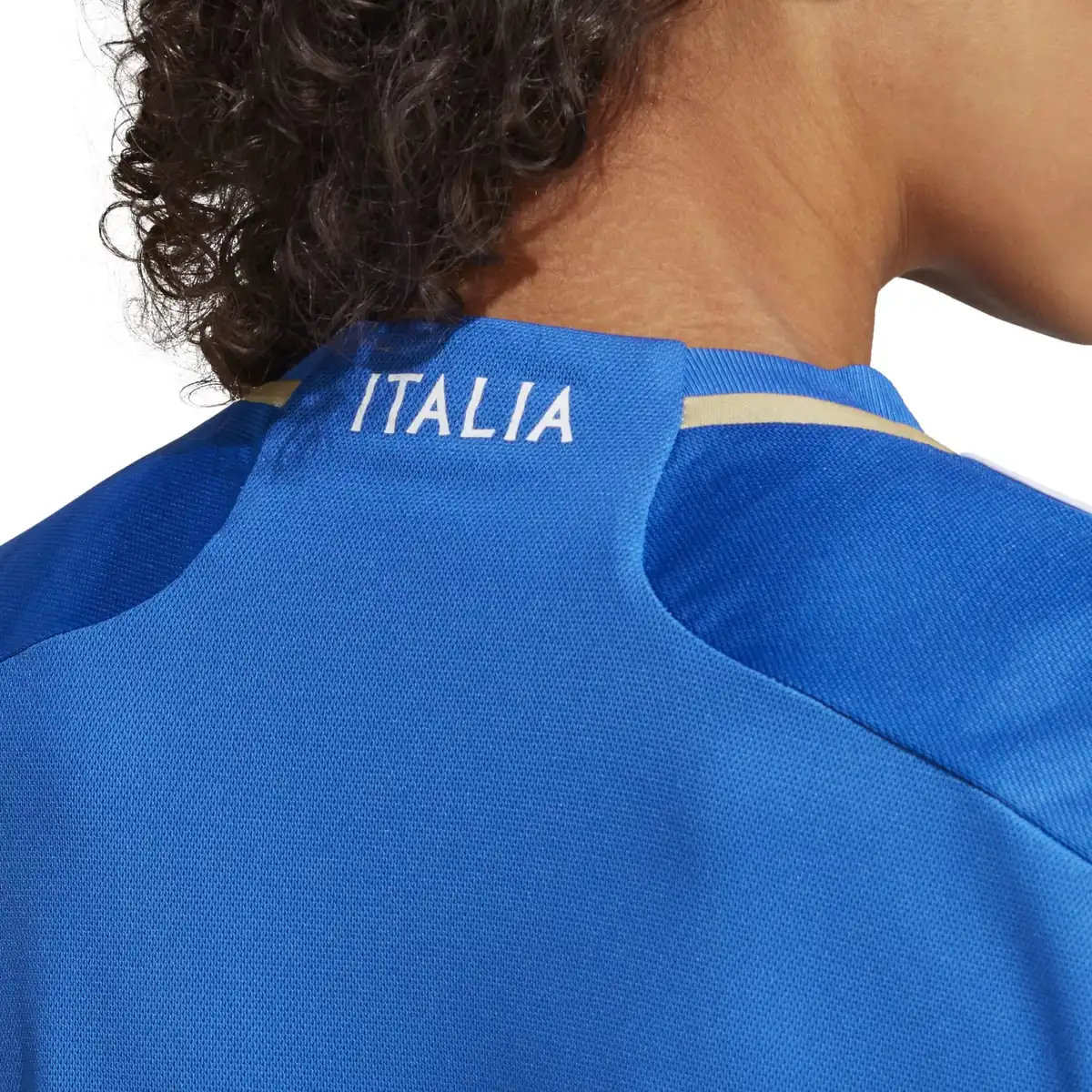 HT1613_12_APPAREL_On_Model_Detail_View_3_white.webp